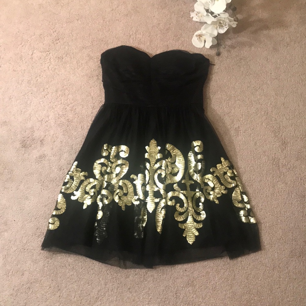Black strapless gold sparkly dress